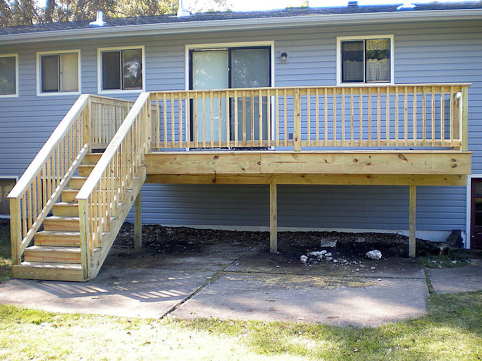 Inspiration for a mid-sized backyard balcony deck remodel with no cover