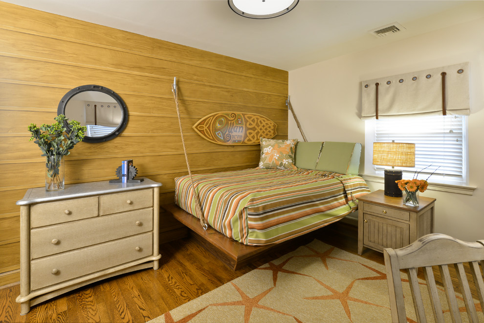 Bedroom - mid-sized coastal guest dark wood floor and brown floor bedroom idea in Other with beige walls