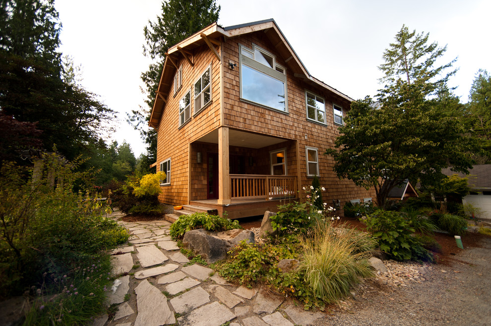 Design ideas for a country exterior in Seattle with wood siding.