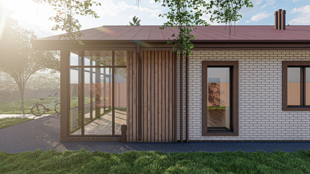 Одноэтажный дом с двумя встроенными гаражами в Лаишево