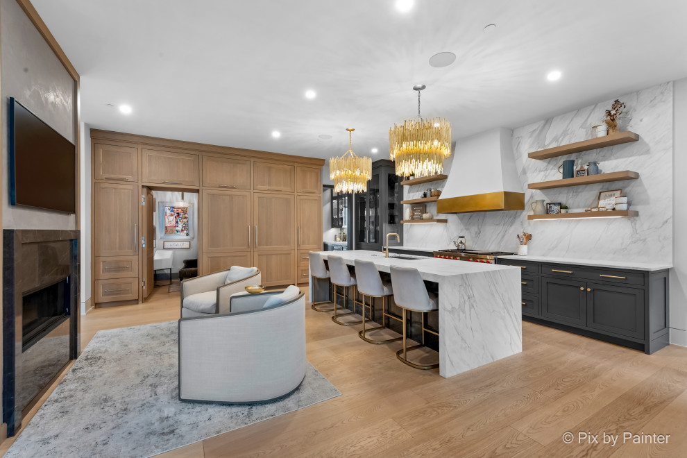 Large transitional l-shaped kitchen photo in Chicago with shaker cabinets, gray cabinets and marble countertops