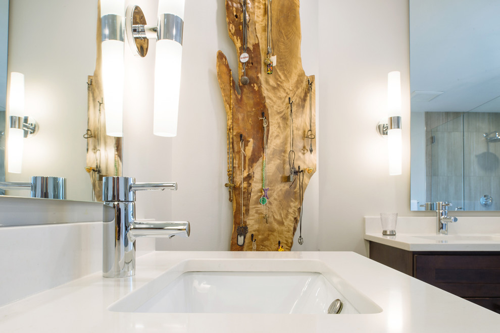 Inspiration for a large country master bathroom in Vancouver with shaker cabinets, brown cabinets, a freestanding tub, a corner shower, a bidet, brown tile, porcelain tile, beige walls, porcelain floors, an undermount sink and marble benchtops.