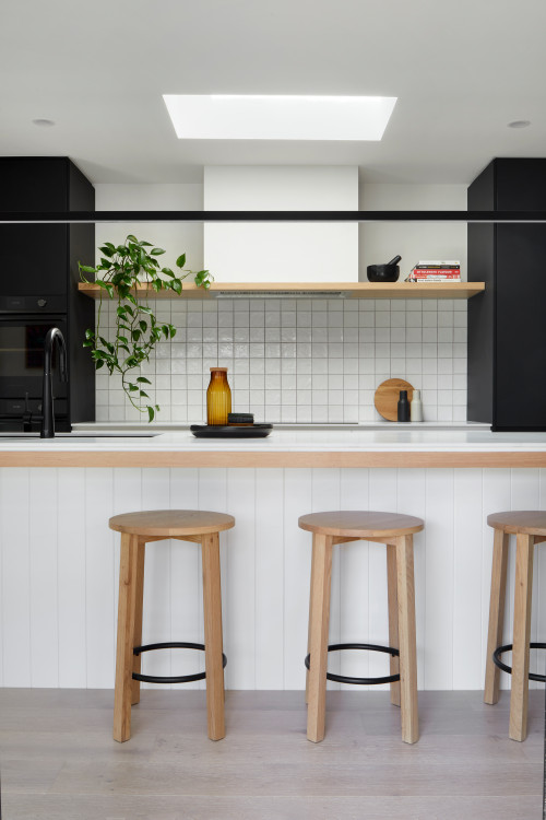 Create a Stylish Space with Minimalist Kitchen Inspirations: White Square Tile Backsplash and a Sleek Wood Floating Shelf