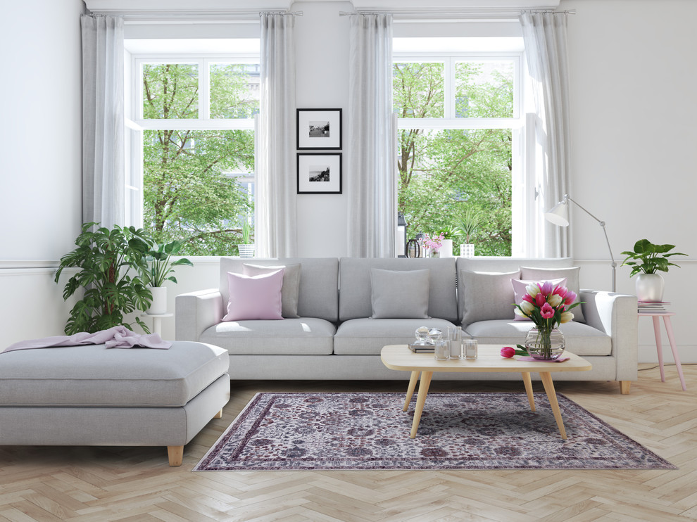 Design ideas for a transitional living room in New York with white walls, light hardwood floors and beige floor.