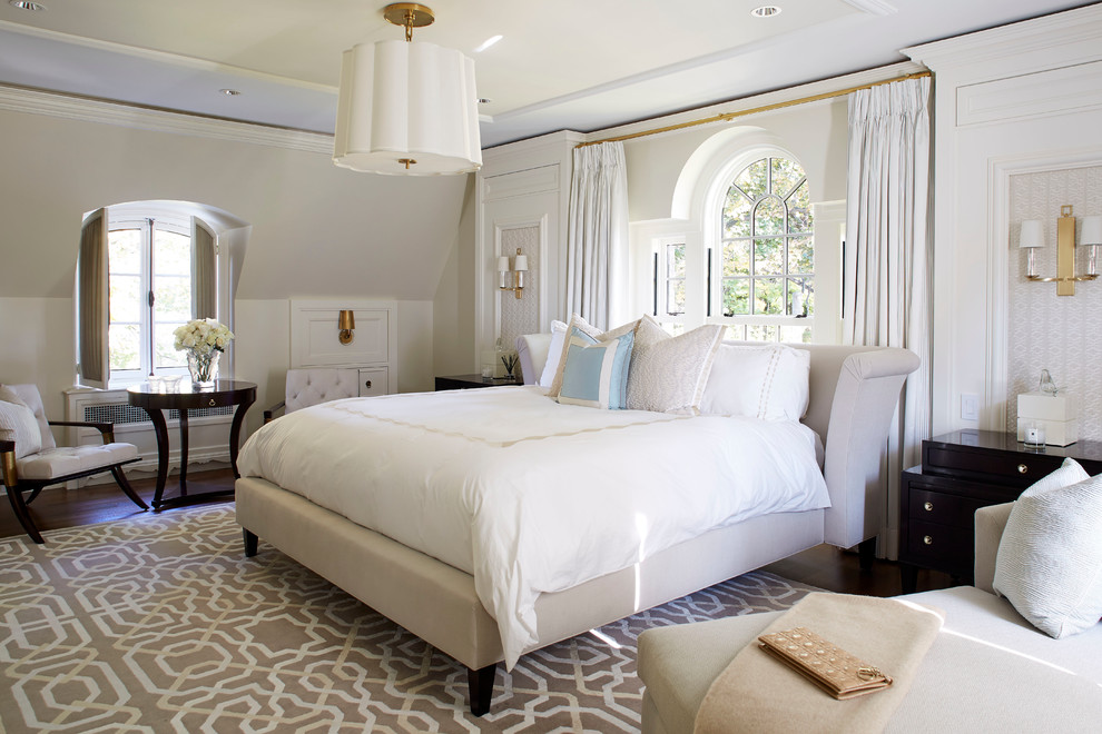 Design ideas for a traditional master bedroom in Montreal with white walls.