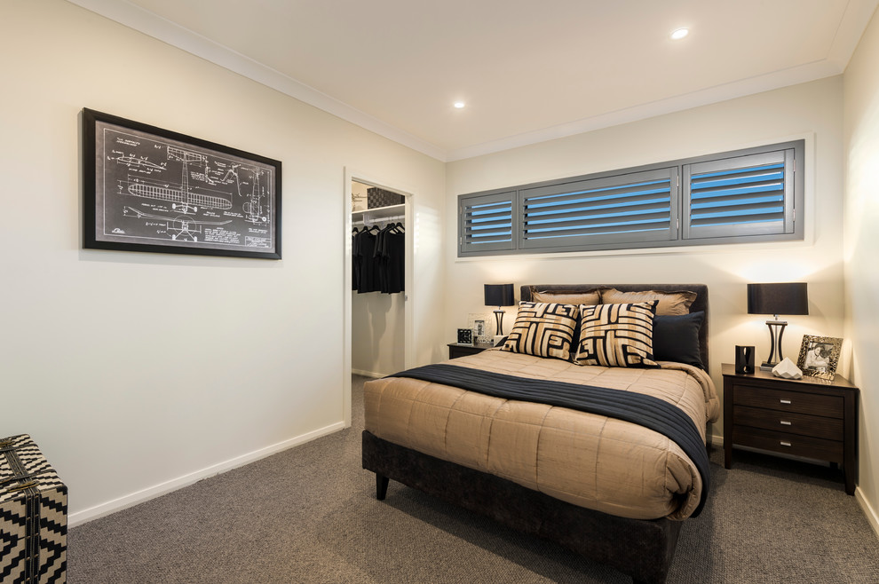 Design ideas for a mid-sized contemporary guest bedroom in Brisbane with beige walls and carpet.