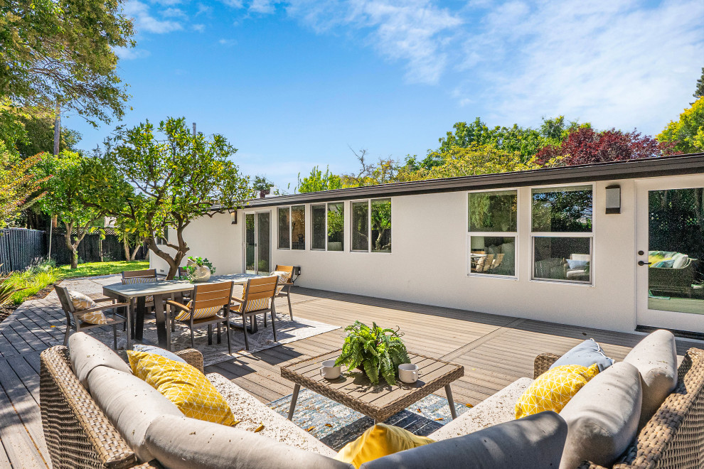 Inspiration for a mid-sized transitional backyard ground level deck remodel in San Francisco with a bbq area