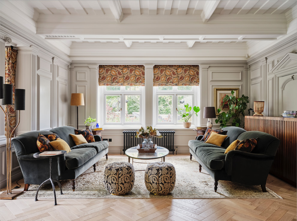 Inspiration for a transitional formal open concept living room in London with white walls, light hardwood floors, a built-in media wall, timber and panelled walls.