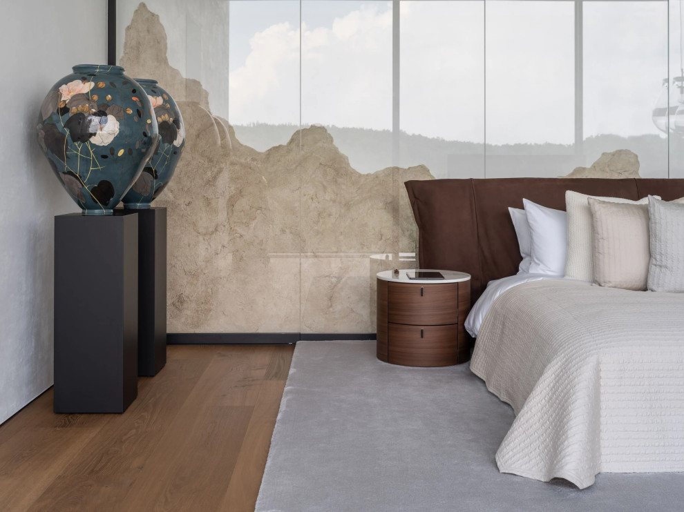 Imagen de habitación de invitados minimalista sin chimenea con paredes grises