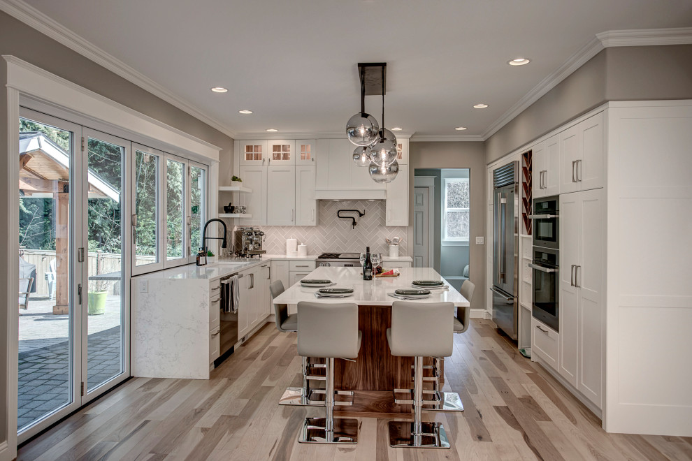 Example of a transitional kitchen design in Seattle