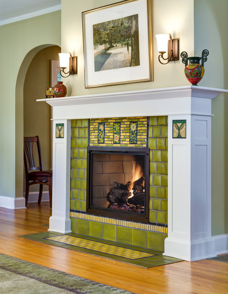 Inspiration for an arts and crafts living room in Detroit with a standard fireplace and a tile fireplace surround.
