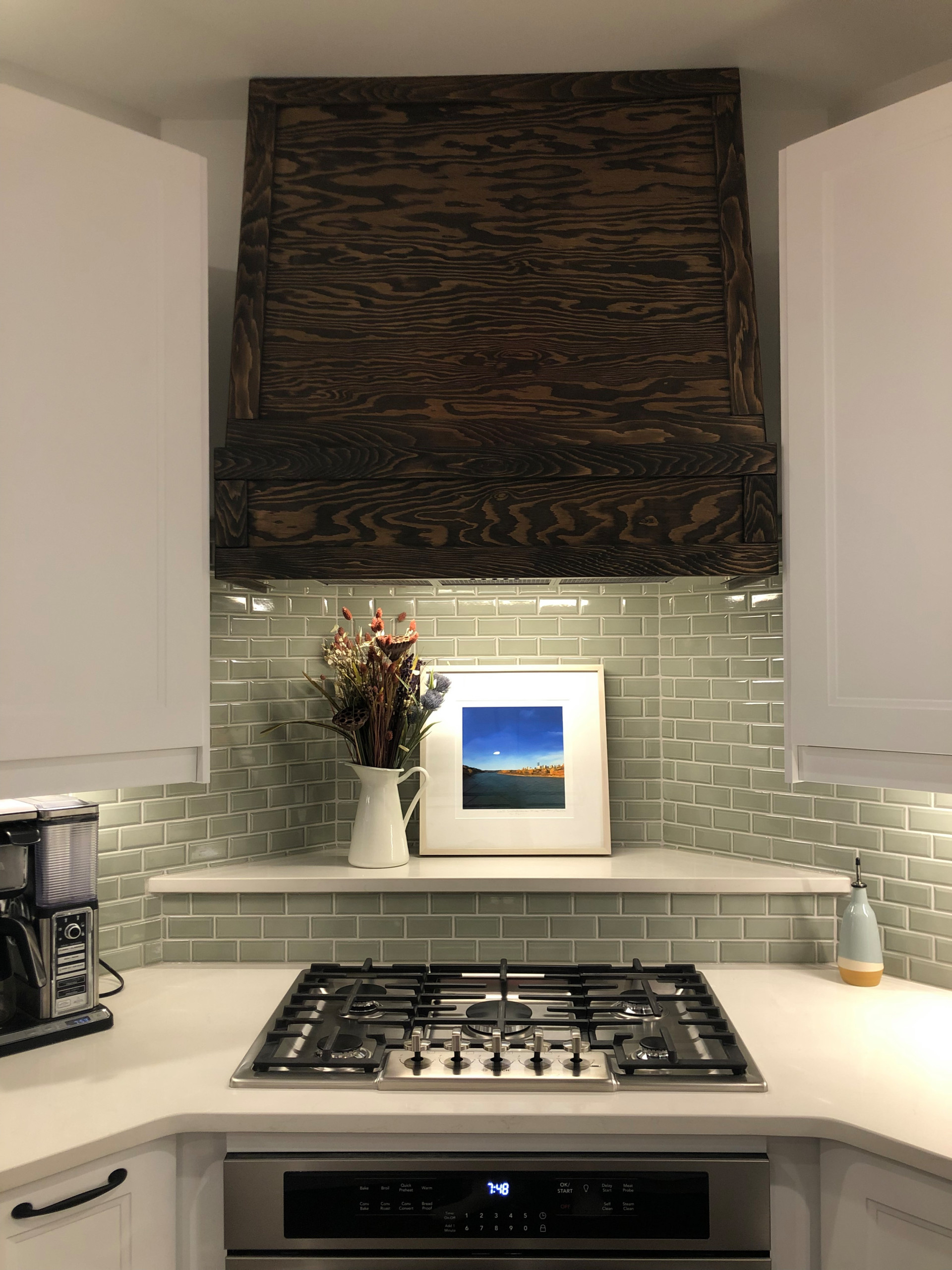 Fir hood fan cover and niche above stove