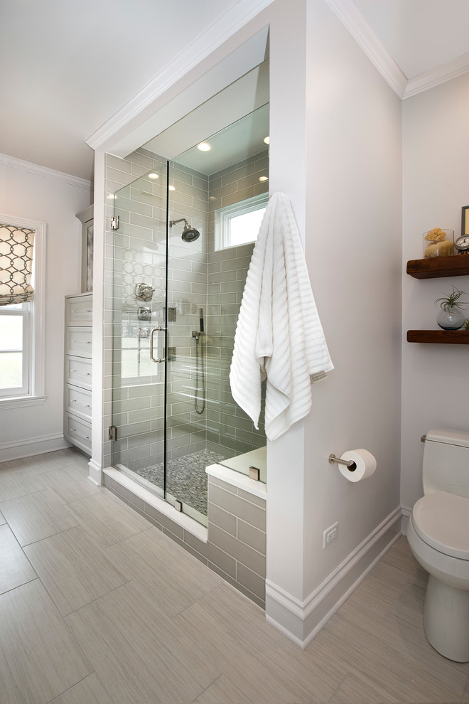 Inspiration for a large transitional master gray tile porcelain tile alcove shower remodel in Chicago with gray cabinets, a one-piece toilet, white walls and an undermount sink