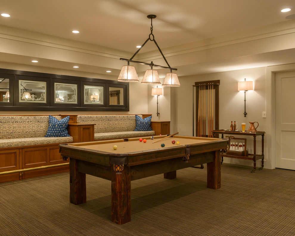 Inspiration for a traditional enclosed family room in New York with a game room, beige walls, carpet and brown floor.