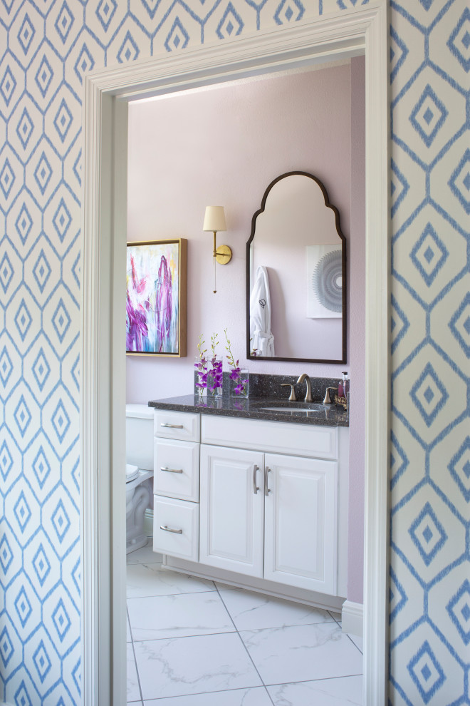 This is an example of a small traditional 3/4 bathroom in Tampa with raised-panel cabinets, white cabinets, an alcove shower, a two-piece toilet, white tile, porcelain tile, purple walls, porcelain floors, an undermount sink, granite benchtops, white floor, a hinged shower door, black benchtops, a niche, a single vanity and a built-in vanity.