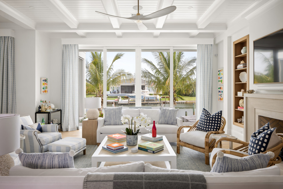Design ideas for a beach style family room in Tampa.
