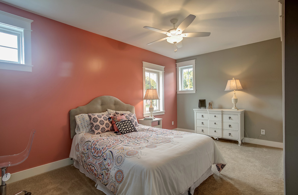 Inspiration for a transitional guest carpeted bedroom remodel in Grand Rapids with beige walls