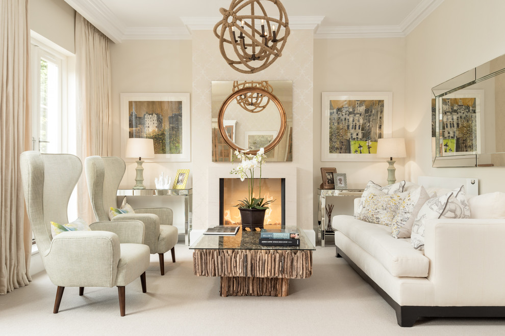 Mid-sized contemporary formal enclosed living room in Edinburgh with beige walls, carpet, a standard fireplace, a stone fireplace surround and no tv.