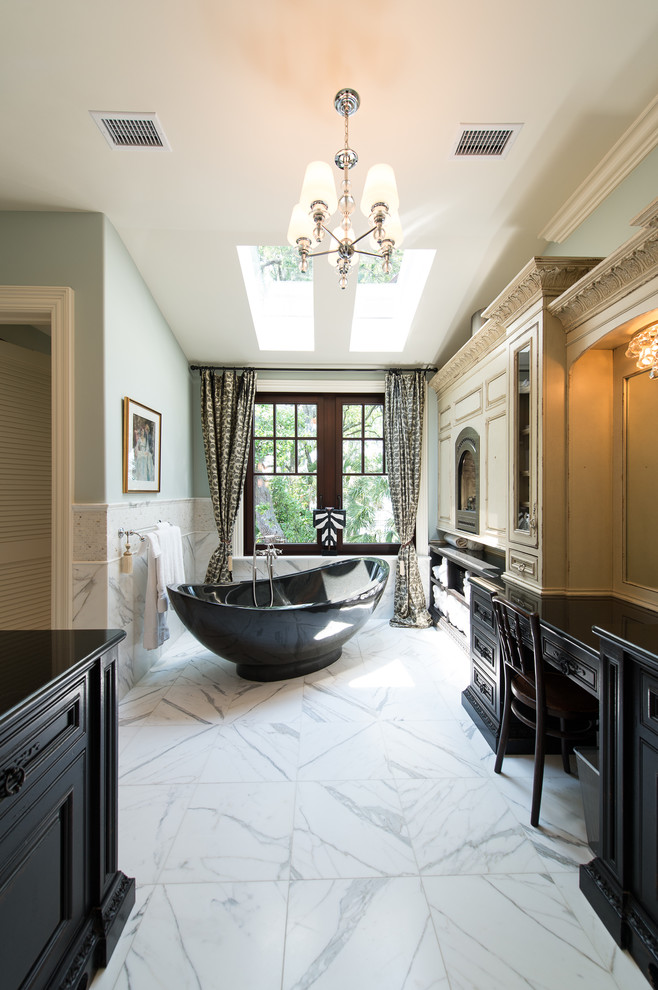 Inspiration for a traditional bathroom in Charleston with a freestanding tub.