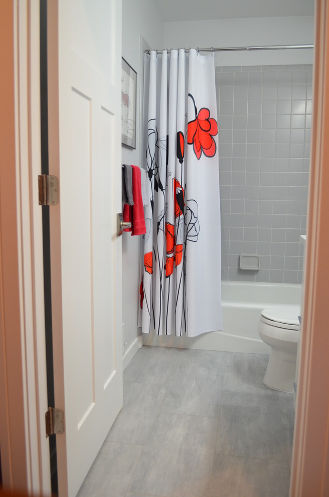 Inspiration for a transitional gray tile and ceramic tile bathroom remodel with shaker cabinets, white cabinets and marble countertops