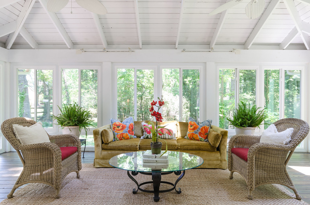 Transitional sunroom in Charlotte with medium hardwood floors, no fireplace and brown floor.
