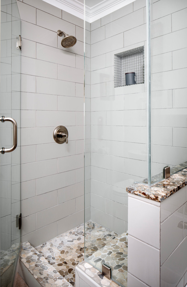 This is an example of a mid-sized transitional master bathroom in San Francisco with gray tile, ceramic tile, white walls, ceramic floors, beige floor and a hinged shower door.