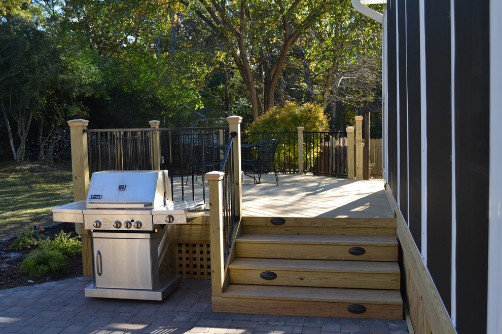 Inspiration for a transitional two-story white deck remodel in Raleigh
