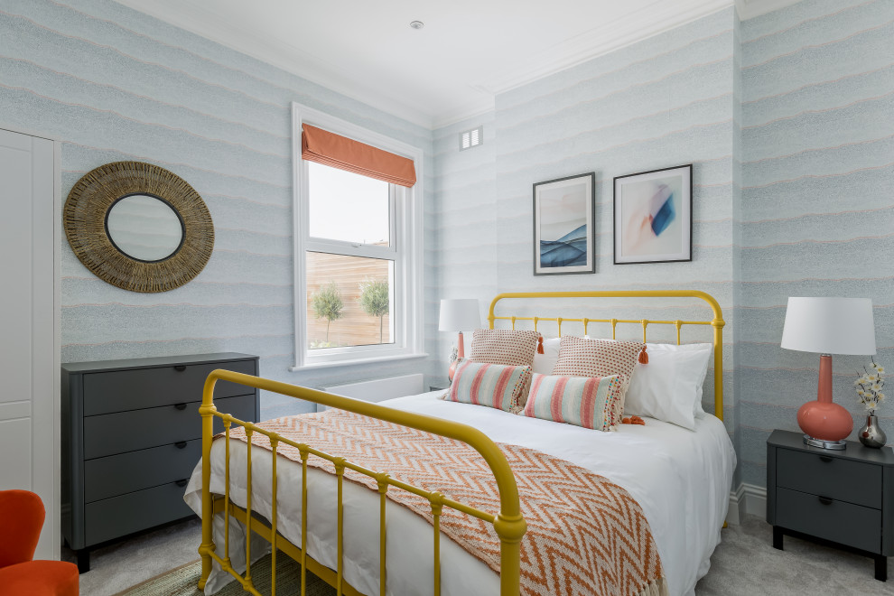 ドーセットにあるビーチスタイルのおしゃれな客用寝室