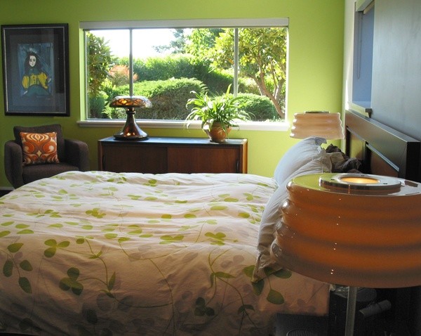 Inspiration for a mid-sized 1950s master carpeted bedroom remodel in Seattle with green walls, a standard fireplace and a stone fireplace