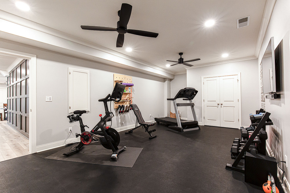 Inspiration for a mid-sized black floor multiuse home gym remodel in Atlanta with gray walls