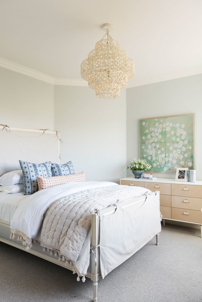 Photo of a mid-sized beach style bedroom in Salt Lake City with grey walls, carpet, no fireplace and grey floor.