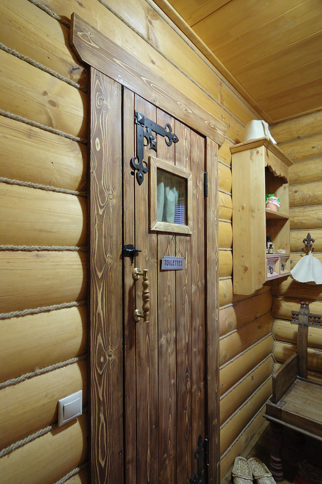 Интерьер бани из бревна