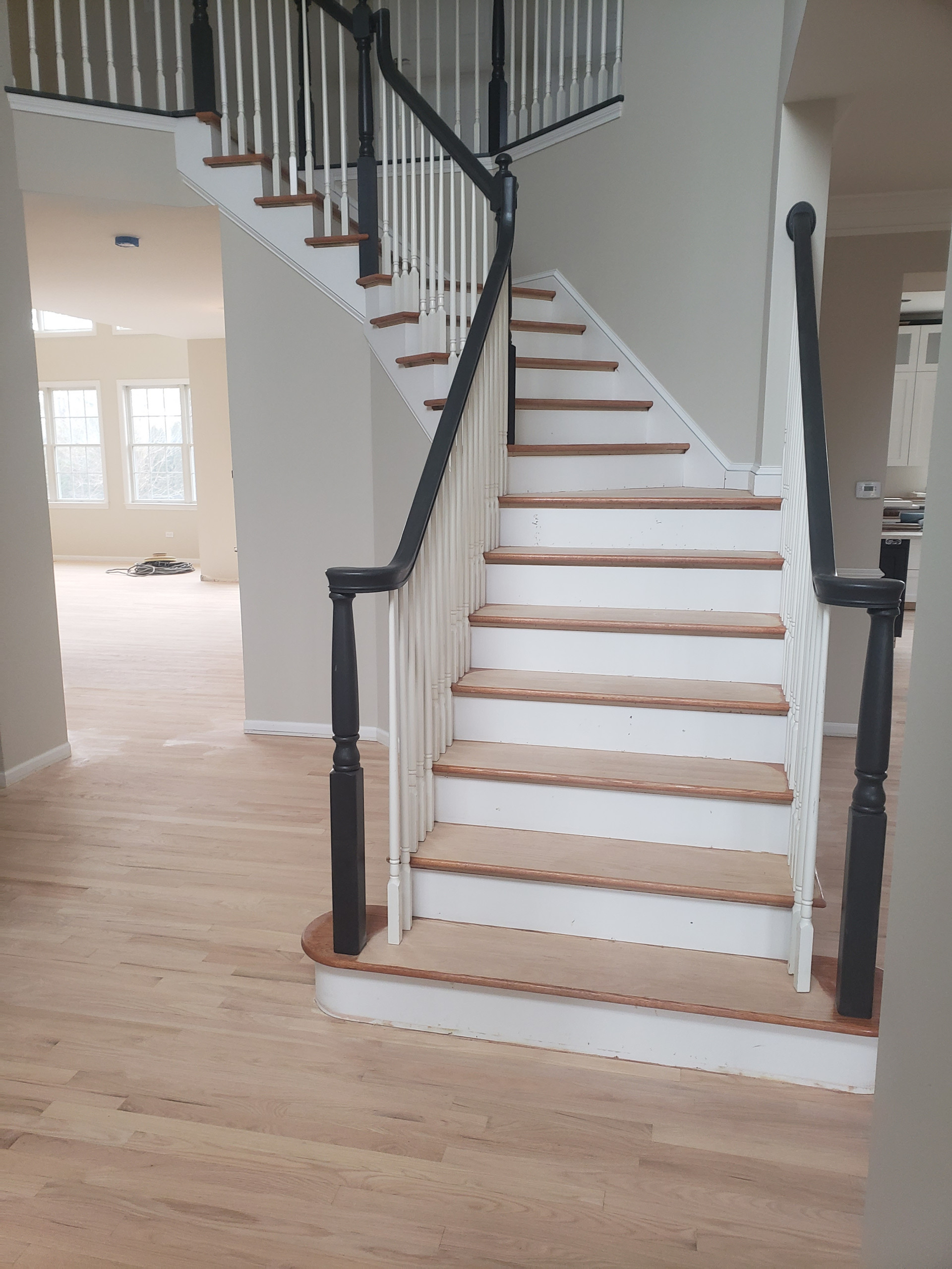 New 2 and 1/4 red oak flooring installed and old flooring refinished