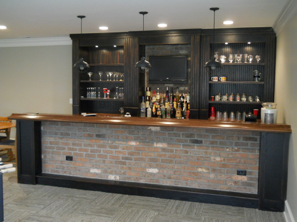 Photo of a traditional home bar in Charlotte.