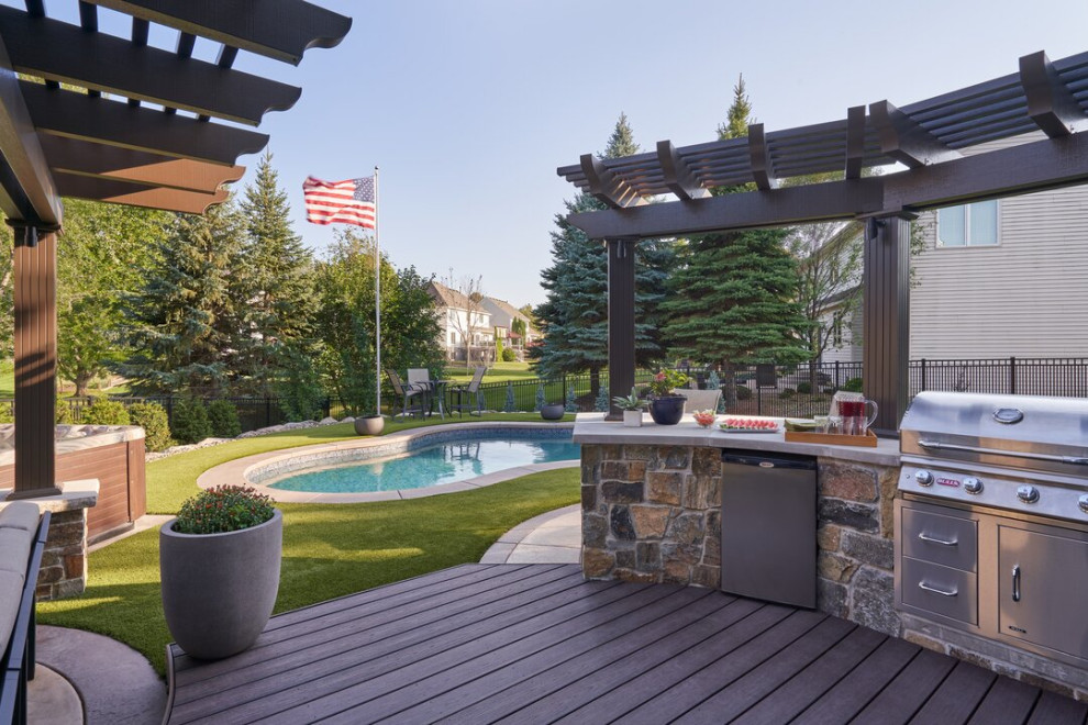 Inspiration for a medium sized classic back ground level terrace in Minneapolis with a pergola.