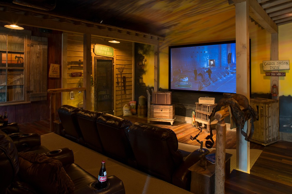 Photo of an eclectic home theatre in Houston.