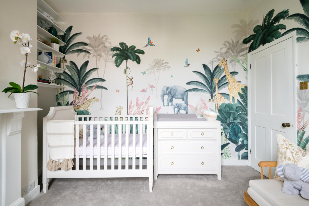 World-inspired nursery for girls in London with grey walls, carpet, grey floors and wallpapered walls.