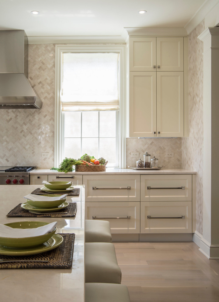 Large elegant l-shaped coffered ceiling eat-in kitchen photo in DC Metro with beige cabinets, beige backsplash, an undermount sink, shaker cabinets, marble countertops, stone tile backsplash, stainless steel appliances, an island and beige countertops