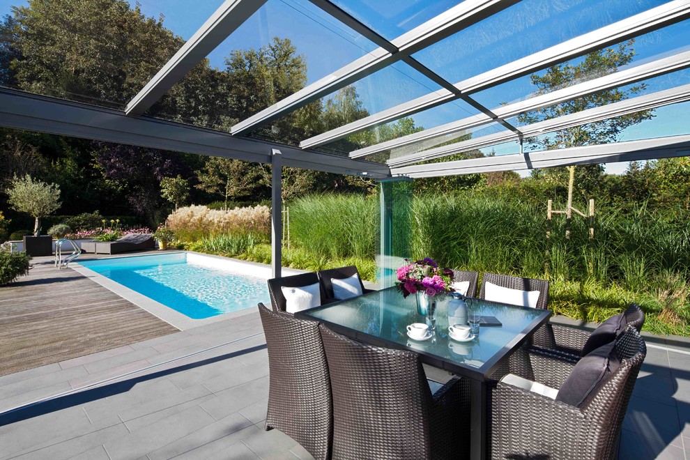 Großer Moderner Wintergarten mit Glasdecke in Sonstige