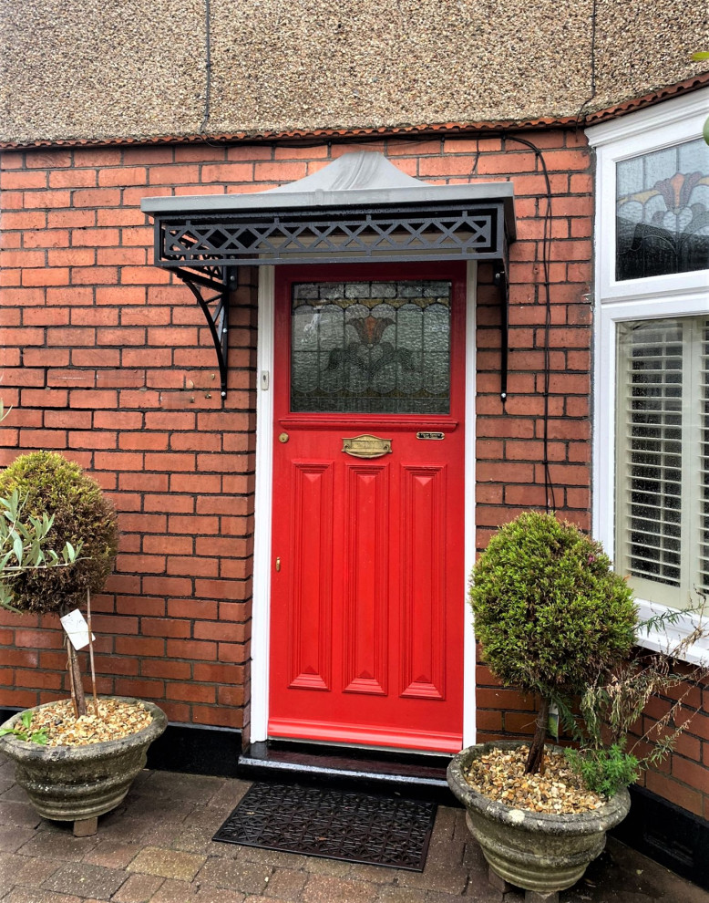 Inspiration for a small classic front door in Other with a single front door and a red front door.