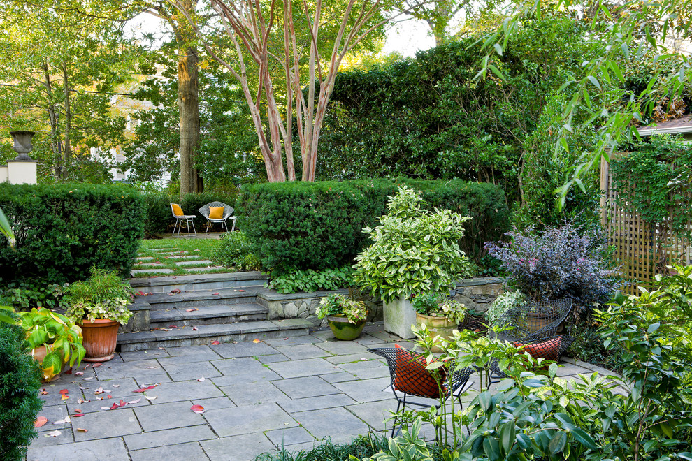 Mid-sized traditional backyard garden in DC Metro with natural stone pavers.