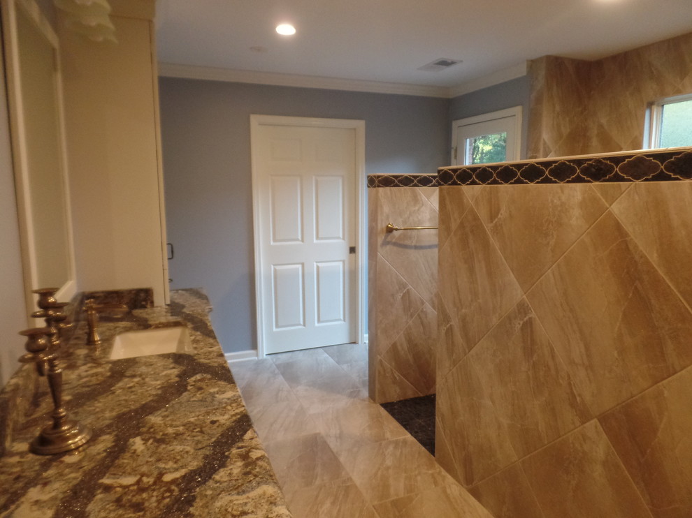 Large transitional master beige tile and porcelain tile porcelain tile and beige floor home design photo with shaker cabinets, white cabinets, a two-piece toilet, blue walls, an undermount sink and quartz countertops
