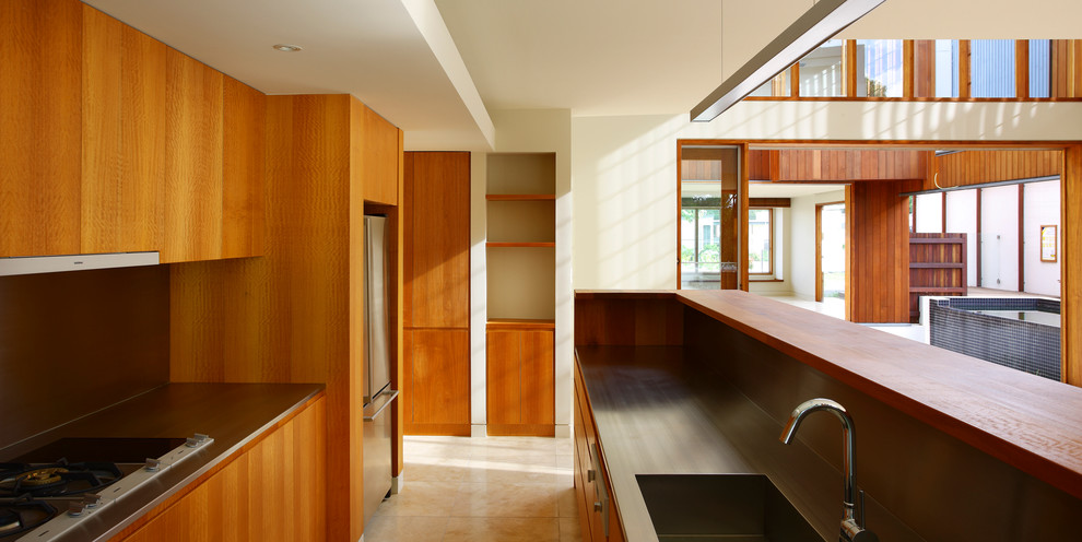 Inspiration for a large contemporary eat-in kitchen in Brisbane with with island.