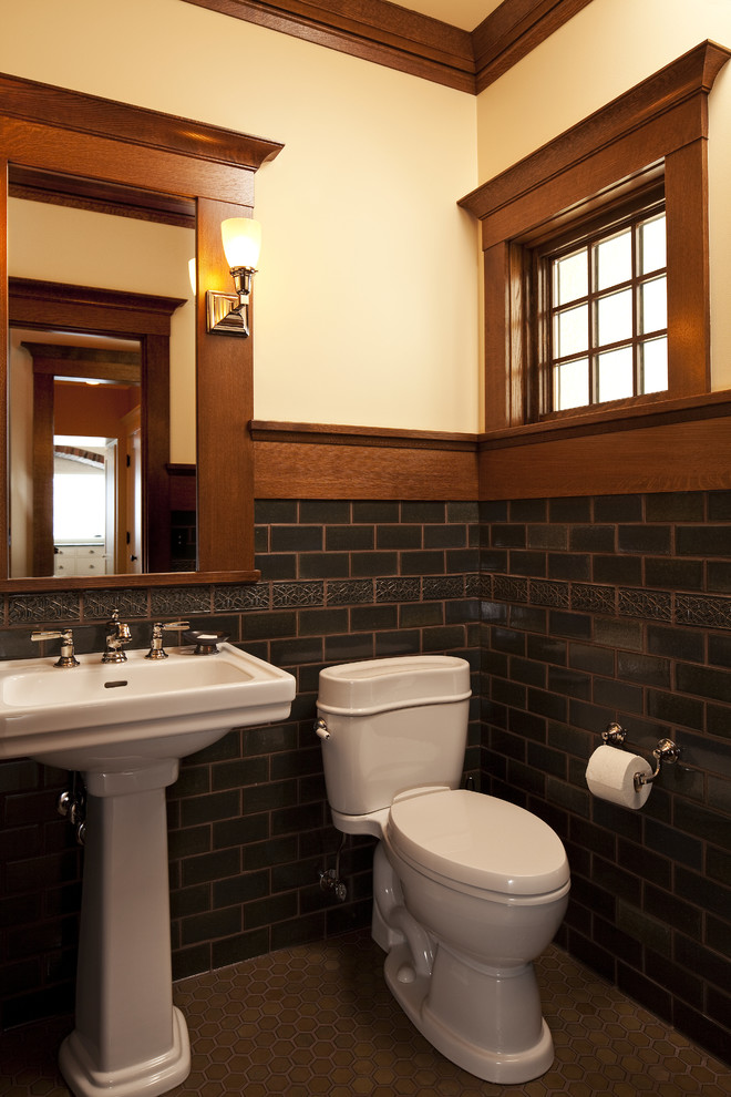 Arts and crafts powder room in Other with a pedestal sink and subway tile.