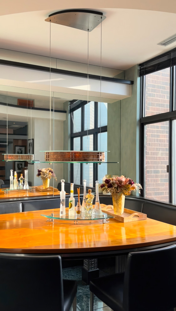 Ispirazione per una sala da pranzo moderna con soffitto ribassato