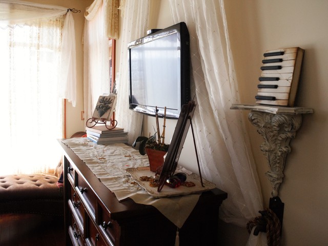 Turtle Mountain HIDDEN TV LIFT AD ON mediterranean-bedroom