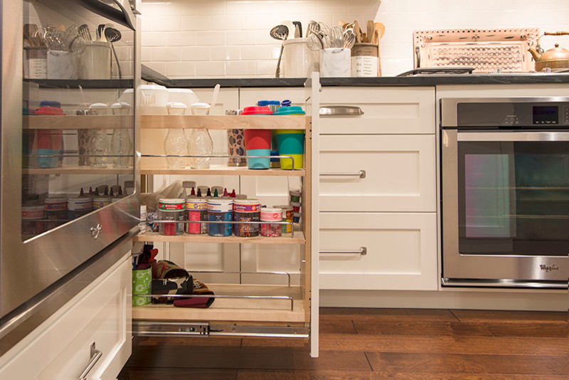 Example of a transitional eat-in kitchen design in Austin with shaker cabinets and white cabinets