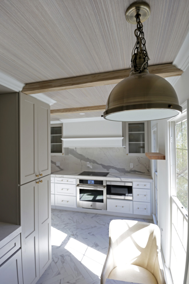 Inspiration for a mid-sized transitional l-shaped marble floor, white floor and exposed beam kitchen remodel in DC Metro with an undermount sink, shaker cabinets, white cabinets, quartzite countertops, white backsplash, quartz backsplash and stainless steel appliances