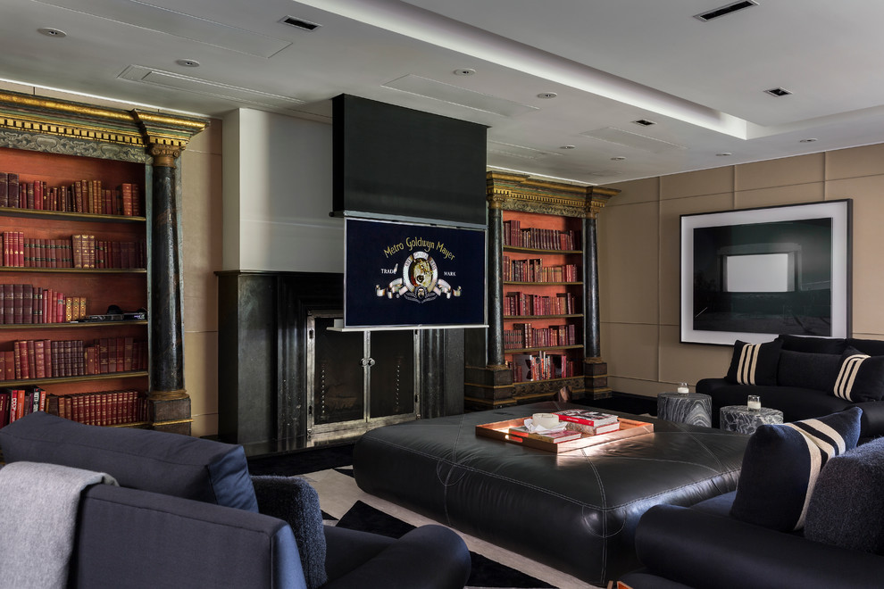This is an example of an expansive traditional open concept home theatre in Los Angeles with beige walls, carpet, a built-in media wall and black floor.