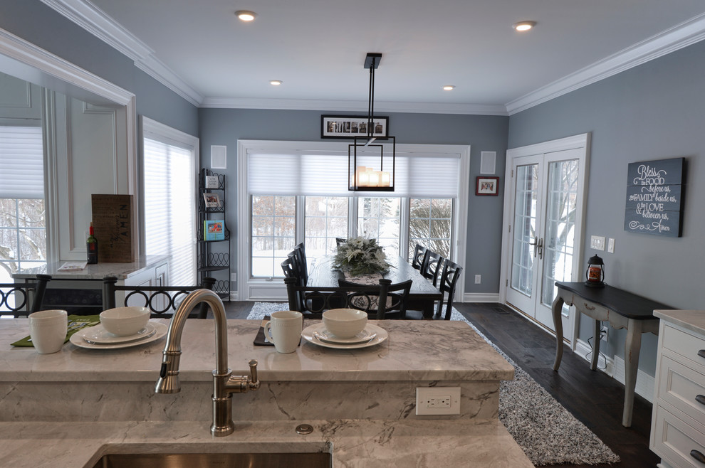 Kitchen - transitional dark wood floor kitchen idea in Cleveland with a single-bowl sink and stainless steel appliances